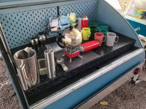 Tom Burick’s tiny trailer includes an equally tiny galley, which he has even used to prepare a Thanksgiving feast.