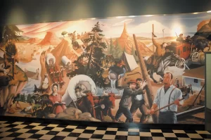 At the Archway, murals reflect on various aspects of American travel and expansion).