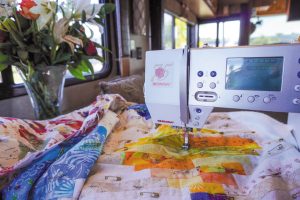 Diane’s Bernina Aurora 440 QE sewing machine is designed for quilting and free-motion stitching.