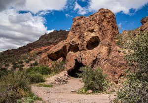 A natural formation known as Skull Rock is located near the end of the off-road trail in Kofa Queen Canyon.