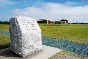 This marker commemorates the first successful airplane flight at the Wright Brothers National Memorial.