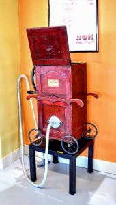 The museum features antiques like the Dustaw vacuum cleaner.