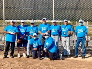 A team from the Senior Texan winter softball league in McAllen, Texas, poses for a photo.