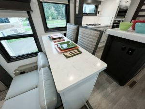 The dinette table overlooks the living room.