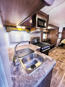 The Nash 24M’s L-shaped galley places the appliances and the double-basin sink within close proximity.
