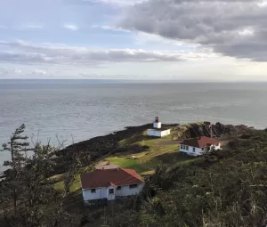 Charlie and Larissa Hoch observed the lighthouse and other buildings at Cape d’Or, a headland near Advocate, Nova Scotia, where the Bay of Fundy runs into the Minas Channel.