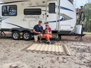 The RV was home base for Charlie and their dogs Lola, left, and Emma when Gina competed in the Ms. Senior World pageant.