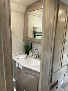 The 1781's rear street-side bath includes a vanity and a medicine cabinet.
