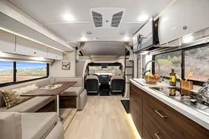 The 24J interior feels roomy with its 6-foot-8-inch height, abundant lighting, and curved overhead cabinets.