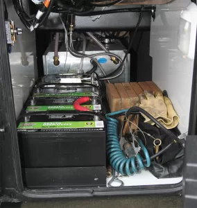 Absorbed glass mat (AGM) batteries don’t outgas and thus can be mounted in unvented compartments.