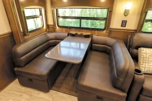 A booth dinette resides in the front slideout.