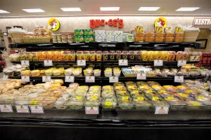 Food options include salads and fresh fruit.