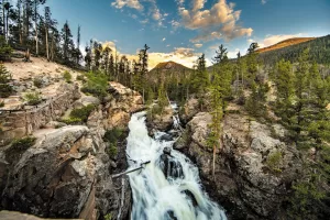 Adams Falls, on Rocky Mountain National Park’s East Inlet Trail, leads to a glaciated valley with great views.