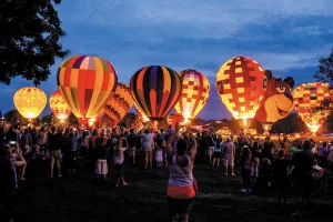 While attending a hot-air balloon festival in Frankenmuth, Michigan, Jeff Engel and other spectators enjoyed a glow-in-the-dark treat.
