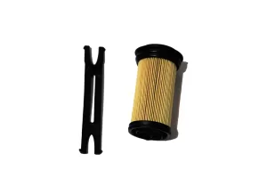 The Cummins-brand DEF filter includes a small tool to help remove the filter from the housing.