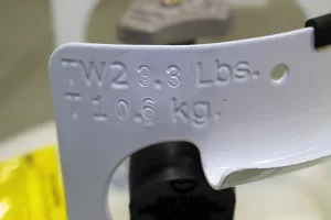 Data on DOT cylinder collars includes tare/empty weight.