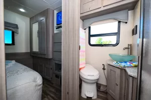 The 272-IV’s walk-through bath has a private room for the toilet and vanity; a shower is across the aisle.