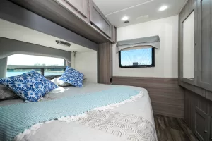 The rear bedroom incorporates a queen-size bed.
