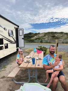 RVing yields many intangibles , such as allowing little Louis to enjoy the oudoors while avoiding crowds and germs.