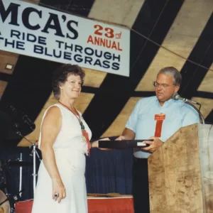 National president Charles Cheneweth honored Genny at the Lexington, Kentucky, convention in 1986.