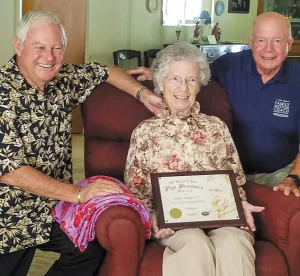 In 2017, FMCA national president Jon Walker, right, and immediate past national president Charlie Adcock, left, presented Genny with the Kenneth T. Scott Pipe Dreamer’s Award.