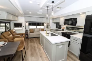 The galley and living area form a comfortable, open floor plan.