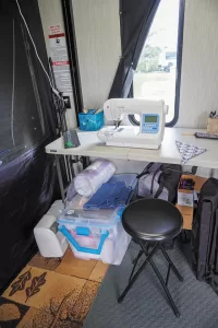 Denise’s setup prioritizes storage and proper lighting.