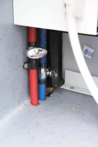 Low-point drain valves help remove water from the fresh-water system.