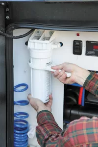 If your RV has a whole-house water filter, be sure to remove it before pumping antifreeze through the system.