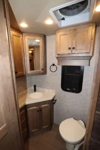 The split bath features a private room on the curb side for the toilet and sink.