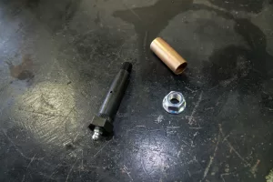 Shackle/spring bolts can be replaced with wet bolts and bronze bushings while servicing the axles.