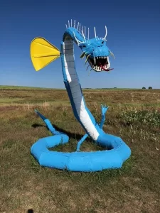 Wayne Porter’s ginormous metal sculptures are crafted from a variety of recycled items, such as scrap metal, old farming equipment, and railroad tie plates.