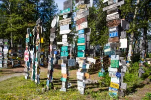 The Sign Post Forest in Watson Lake notes the distance to travelers’ hometowns.