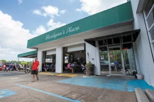 Grab a bite to eat at Marilynn’s Place while watching the Mardi Gras parade.