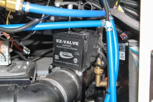 Electric dump valves, such as this EZ-Valve by Valterra, can be mounted in inaccessible locations.