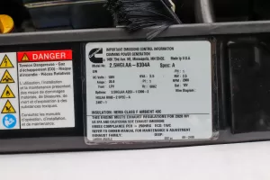The ID sticker can be found on the outside-facing lower side on most Cummins Onan generators. The QD diesel model has a couple of them.