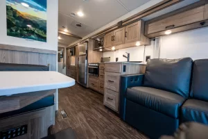 A full-wall slideout in the Vista 29NPF holds the galley and the sofa or theater seating.
