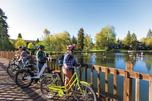 Visitors can cycle or walk Bend’s River Trail along the Deschutes River.