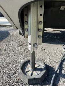 Buy plastic pads or leveling blocks to place under leveling jacks, or opt for permanently installed SnapPads, shown here.