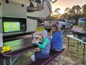 Enjoy the game outdoors, with fun food and access to the interior comforts of your RV a few steps away.