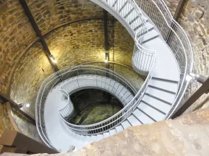 In Greensburg, steps descend to the Big Well, today housed in a museum and visitor center.