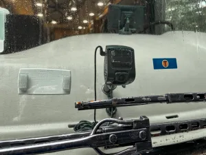 The author’s camera, as viewed from outside, is mounted low on the coach windshield.