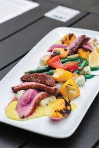 Located in the 1904 Canadian Bank of Commerce building in Kamloops, Brownstone Restaurant serves upscale food.