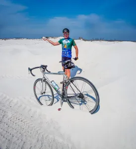 Bicyclists have access to the sugary sand of Florida’s Emerald Coast.