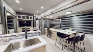 The Wildcat 33CHEF fifth-wheel boasts nicely equipped galley and dining areas.