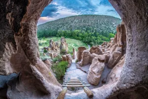 At Bandelier National Monument, in the Talus House area, this view from a cavate (cliff dwelling) overlooks Frijoles Canyon.