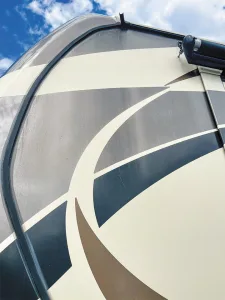 Reducing UV exposure and keeping the RV washed and waxed can help prevent fading fiberglass.