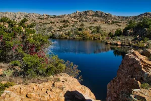 The Wichita Mountains provide a backdrop for freshwater lakes and streams.