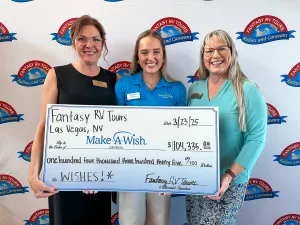 Fantasy RV Tours COO Stacey Rabung, left, and ambassador liaison Kara Haselton, right, with Katie Condor of Make-A-Wish Georgia.