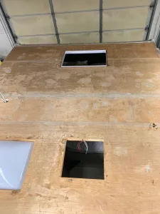 With the rubber removed, the wood substrate can be examined for damage or rot.